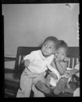 Ocia Mae Miles and brother Herman at hospital after eating some "strange bluish powder" in Los Angeles, Calif., 1949