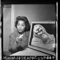 Teacher Eve Clark explaining diagram on birthing in Pasadena Unified School District's Teen Mothers Class, Calif., 1965