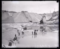 Flooded gravel pits and workers of Blue Diamond Cement Company, Los Angeles, 1920