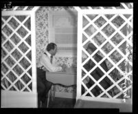 David Bacon murder case; two men seated at table in rented cottage in Laurel Canyon, Calif., 1943