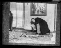 John Fraser searches through the rubble left from the bombing, Glendale, 1924