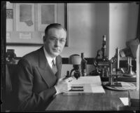 Document examiner J. Clark Sellers in lab, 1933