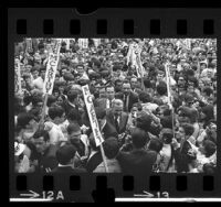 Senator Eugene J. McCarthy making his way through crowd at campaign rally in Los Angeles, Calif., 1968