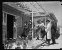 Lillian Gifford greets visitors at The Times' model home, Los Angeles, 1935