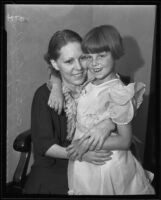 Gladys Carter and daughter Virginia embrace, Newhall, 1935