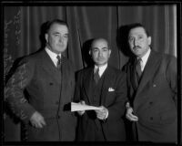 Gerald Fitzgerald, Tom May, and W. A. Holt raise money on behalf of the Community Chest, Los Angeles, 1935