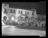 Spectators watching arrivals at premiere of motion picture "Life of Emile Zola" in Los Angeles, Calif., 1937