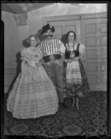 Katherine Gibbon, J. W. McKinley, and Mrs. G. R. Martin at the Bachelors' Mardi Gras Ball at the Biltmore, Los Angeles, 1936