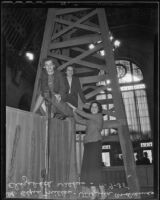 Dixie Miller, Virginia Andrews, and Elizabeth Wilkes with an oil rig in the Biltmore Hotel, Los Angeles, 1935