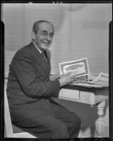 Dr. U. L. Di Ghilini poses with a diploma issued by the Spiritual Psychic Science Church, [Los Angeles], 1936