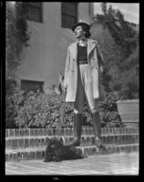 Elaine Barrie and her dog at the Biltmore, Santa Barbara, 1936