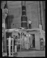 William Edwards Stephens working on an atom smasher at Caltech, Pasadena, 1935