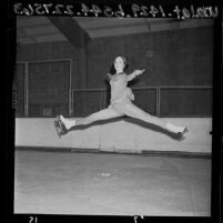 16 year-old ice skater Peggy Fleming practicing jump for national title, 1965