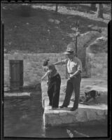 Bill Hackley arresting Virginia Mohr who started to fish before May 1, Los Angeles County, 1936