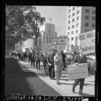 Fire fighters with signs reading "Long Hours Kill Firefighters Fast!," picketing Los Angeles City Hall, Calif., 1966