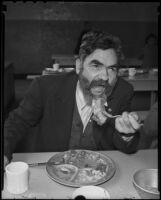 Thomas Wells enjoys a Christmas dinner at the hands of charity, Los Angeles, 1935