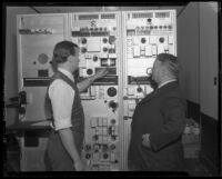 Los Angeles Mayor Frank Shaw and G.H. Bishop in television or radio studio, [Los Angeles?], 1933-1938