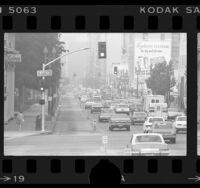 Traffic passing empty bus lane along Spring Street during RTD transit strike in Los Angeles, Calif., 1976