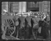 Pallbearers place William Traeger's casket on caisson at Patriotic Hall, Los Angeles, 1935