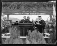 Rufus B. Von Kleinsmid and other faculty members, University of Southern California graduation, Los Angeles Memorial Coliseum, Los Angeles, 1932