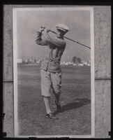 Professional golfer Harry Pressler swings at the Hacienda Golf Club, La Habra Heights, 1922-1940