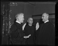 Marshall McComb sworn in while Judges Charles McCrail and Walton Wood witness, Los Angeles, 1938