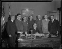 P. B. Harris, J. Stuart Neary, Richard Sasche, Samuel M. Haskins, Patrick Joseph O'Brien, R. B. Armstrong, A. W. Hoch and Mayor Frank Shaw gather to discuss the railway strike, Los Angeles, 1934