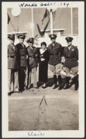 Five men in uniform and one woman, World's Fair, Chicago, 1934