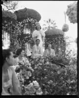 Tournament of Roses Queen Muriel Cowan and 4 attendants on the "Firebird" float, Pasadena, 1935