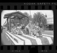 Chowchilla kidnapping bus driver Ed Ray and children riding on float in parade held in his honor in Chowchilla, Calif., 1976