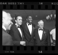 John W. Mack, Pat Riley, Magic Johnson, and Jerry West at the Century Plaza, Century City, 1989