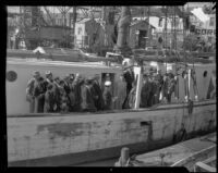 Jury and defendant, William James (Curly) Guy visit Walter Wanderwell's yacht, Carma, Los Angeles, 1933