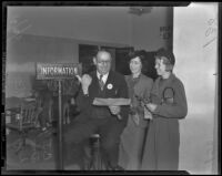 C. J. Young directs Dee Vaugn and Lucille Guelker to the tax office, Los Angeles, 1938