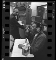 UCLA professor Richard F. Docter conducting an experiment on Phillip Zuckerman, 1965