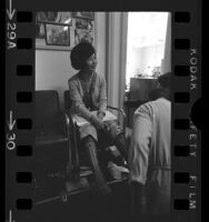 California Assemblywoman March Fong Eu getting her boots polished, 1971