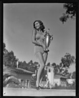 Doris Rae Compton holding trophy, San Diego, California, 1935