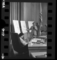 Coroner Thomas T. Noguchi describing wound diagrams from Robert F. Kennedy autopsy to the Los Angeles Board of Supervisors, 1974