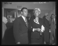 Barbara Payton with Attorney Milton Golden at Los Angeles Court House during alimony battle with Franchot Tone, Los Angeles, 1952