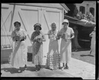 Mrs. H. M. White, Mrs. H. E. Bayhi, Mrs. Genevieve Paonessa, and Mrs. Donald Jennings in sunbonnets at garden party, Los Angeles, 1935