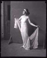 Catherine Bedford posing in a Grecian-style costume and head band, Los Angeles, circa 1915