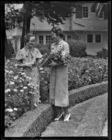 Jean Garrison and Margaret Robinson collect flowers on vacation, Santa Monica, 1936