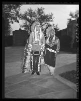 Iron Eyes Cody and Willowbird at services for Charles Wakefield Cadman in Glendale, Calif., 1947