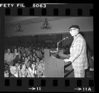 Groucho Marx speaking before crowd at the Los Angeles Book Fair, 1976