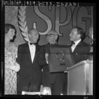 Arthur Freed with Gene Kelly, Fred Astaire and Julie Andrews as he receives the Screen Producers Guild's Milestone Award, 1964