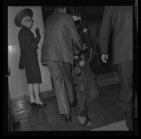 Protester Josh Gould removed forcibly from City Council chambers after being denied a hearing regarding police actions at a demonstration during President Johnson's visit to Century Plaza Hotel. 1967