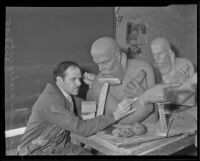 Alexander Archipenko at work on a portrait bust of the Ukranian poet Taras Shevchenko, Los Angeles, 1937