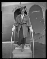 Aimee Semple McPherson deboarding a plane, Los Angeles