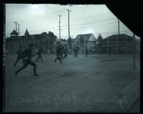 ROTC cadets running drills at Polytechnic High School, Los Angeles, 1920s