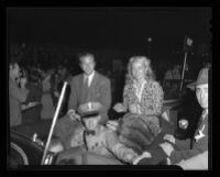 Dick Powell and Joan Blondell in the Moon Festival parade, Chinatown (Los Angeles), 1941