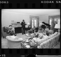 Mayor Tom Bradley hosts guests in the living room of the Official Mayor's Residence